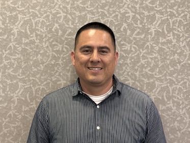 Staff member Robert Reyes from ID_3d0d3dabd49c