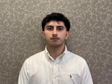Staff member Christian Guerra from ID_0075b2528e26