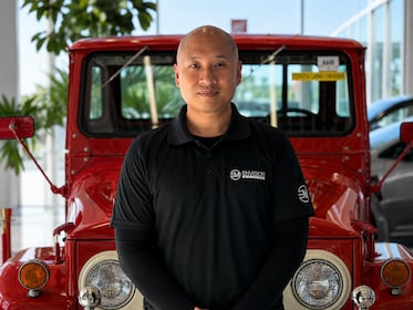 Staff member Henry Bin from ID_f54321