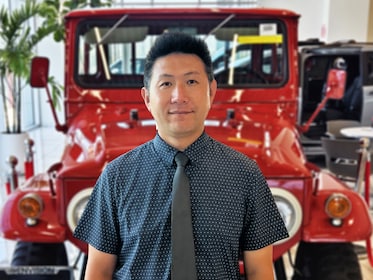 Staff member Jimmy Wei from ID_6f1c25