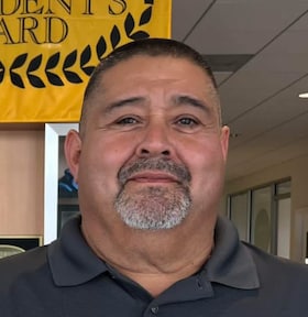 Staff member Enrique Rosas from ID_2d72f94e45b6