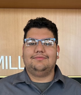 Staff member Alex Esquivel from ID_2d72f94e45b6