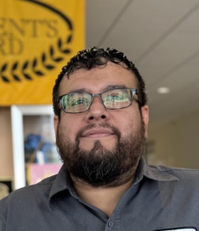 Staff member Hector Dominguez from ID_2d72f94e45b6