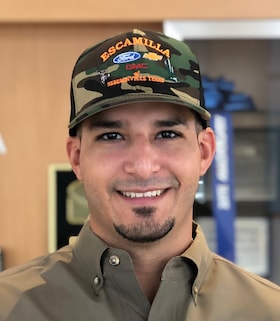 Staff member Justin Escamilla from ID_2d72f94e45b6