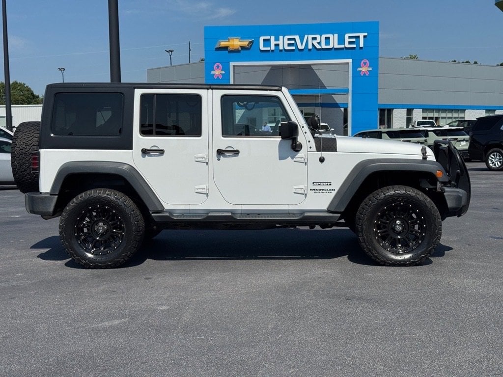 Used 2015 Jeep Wrangler Unlimited Sport with VIN 1C4BJWDG7FL647034 for sale in Easley, SC