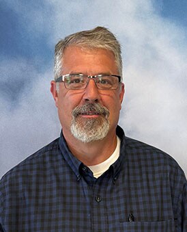 Staff member Mike Bibby from ID_9e65d8ccc0f4