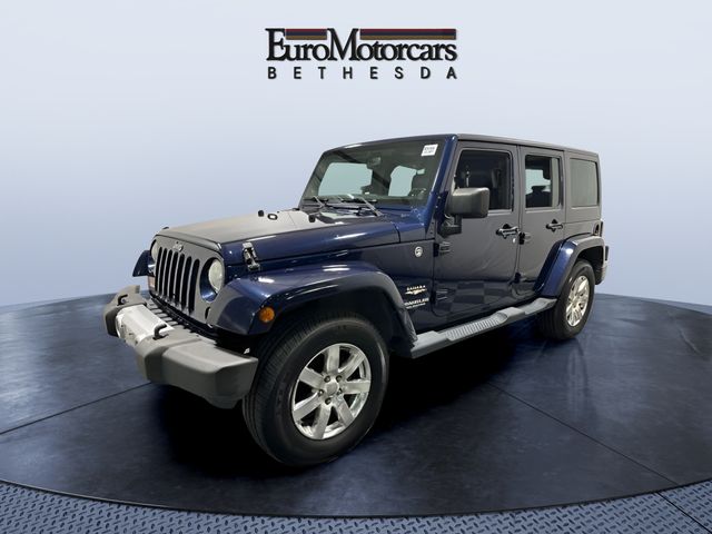 Used 2013 Jeep Wrangler Unlimited Sahara with VIN 1C4HJWEG4DL592581 for sale in Bethesda, MD