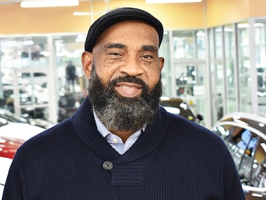 Staff member Al J from 5c6110377357