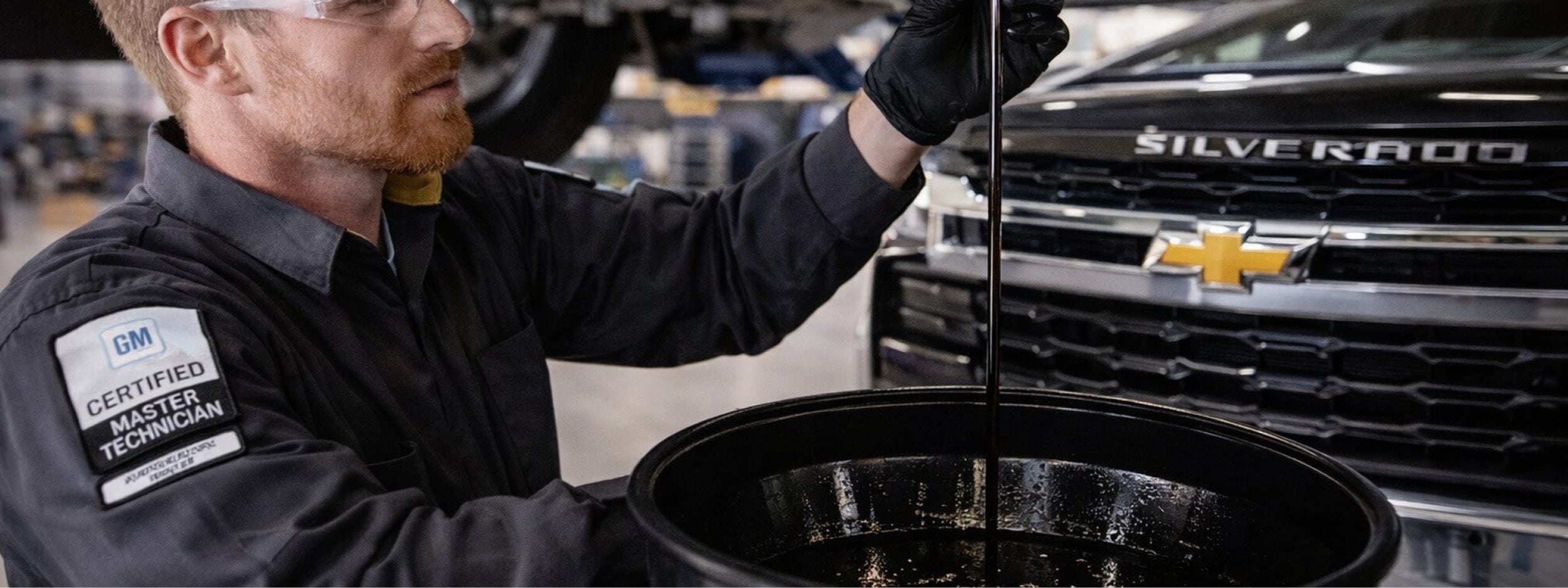Chevy%20Tecnician%20Oil%20Change.jpg
