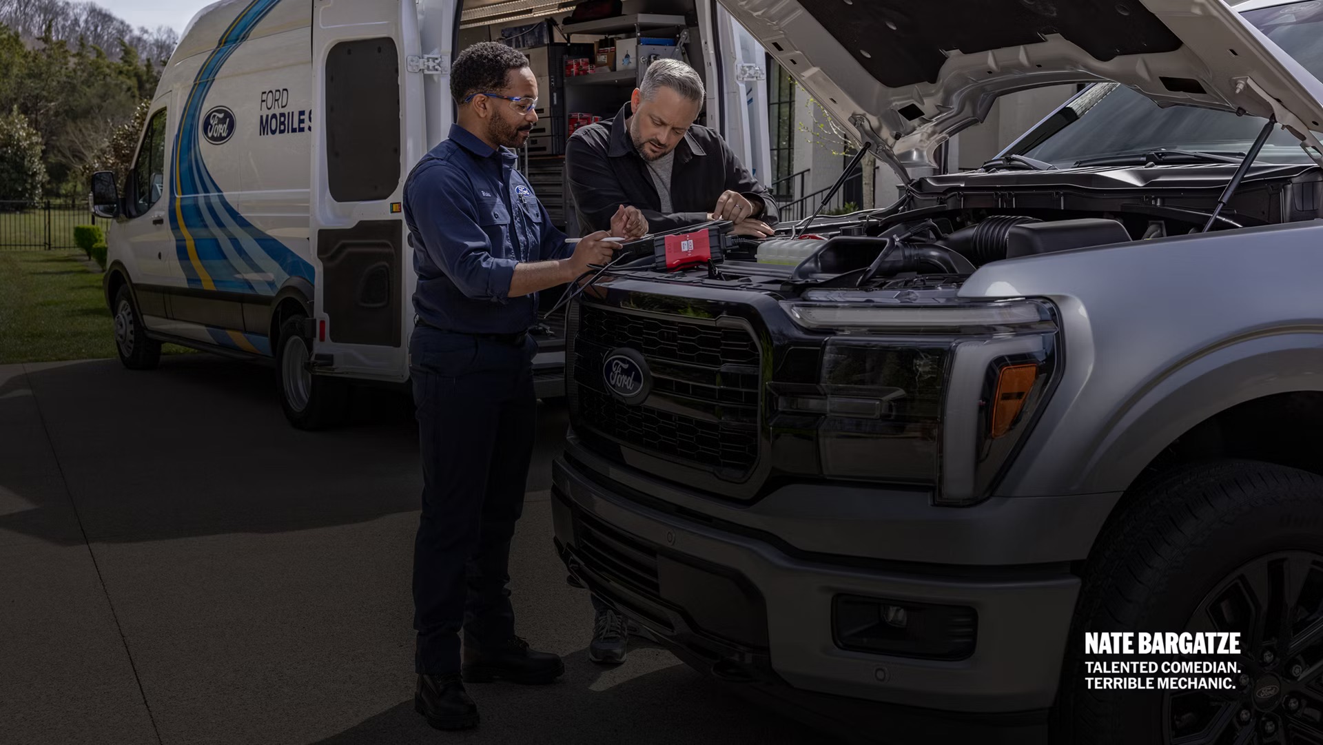 Evergreen Ford Mobile Service Technician working on vehicle in driveway