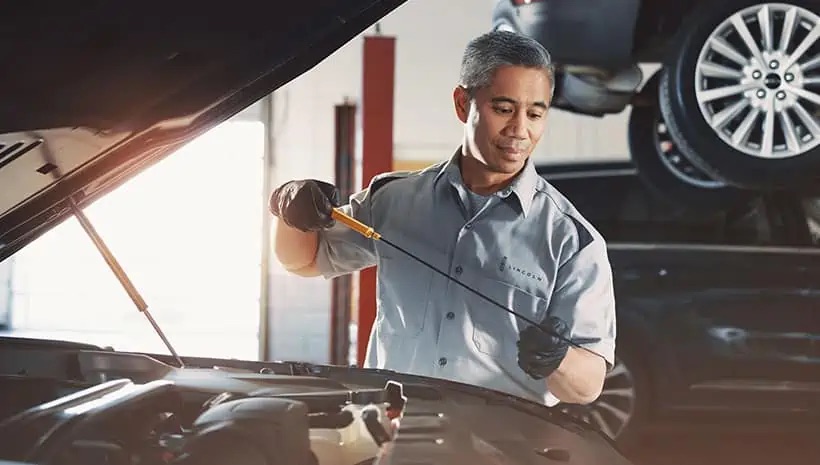 Factory-trained Lincoln technician performing maintenance at Evergreen Lincoln in Issaquah