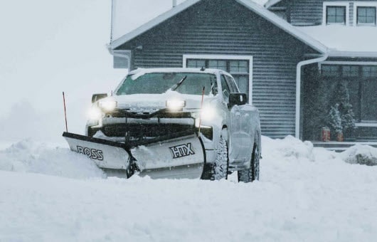 BOSS HTX V plow plowing parking lot in Maine from Auto City of Maine