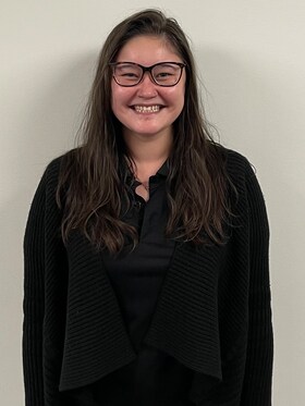 Staff member Aizhan "Zee" Gwynne from ID_295654