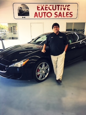 Staff member George Beltran from 502a5284c948