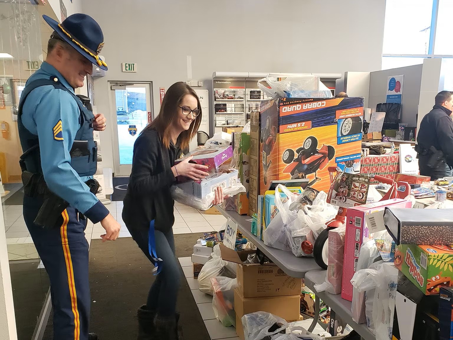  Mom picking out toys.