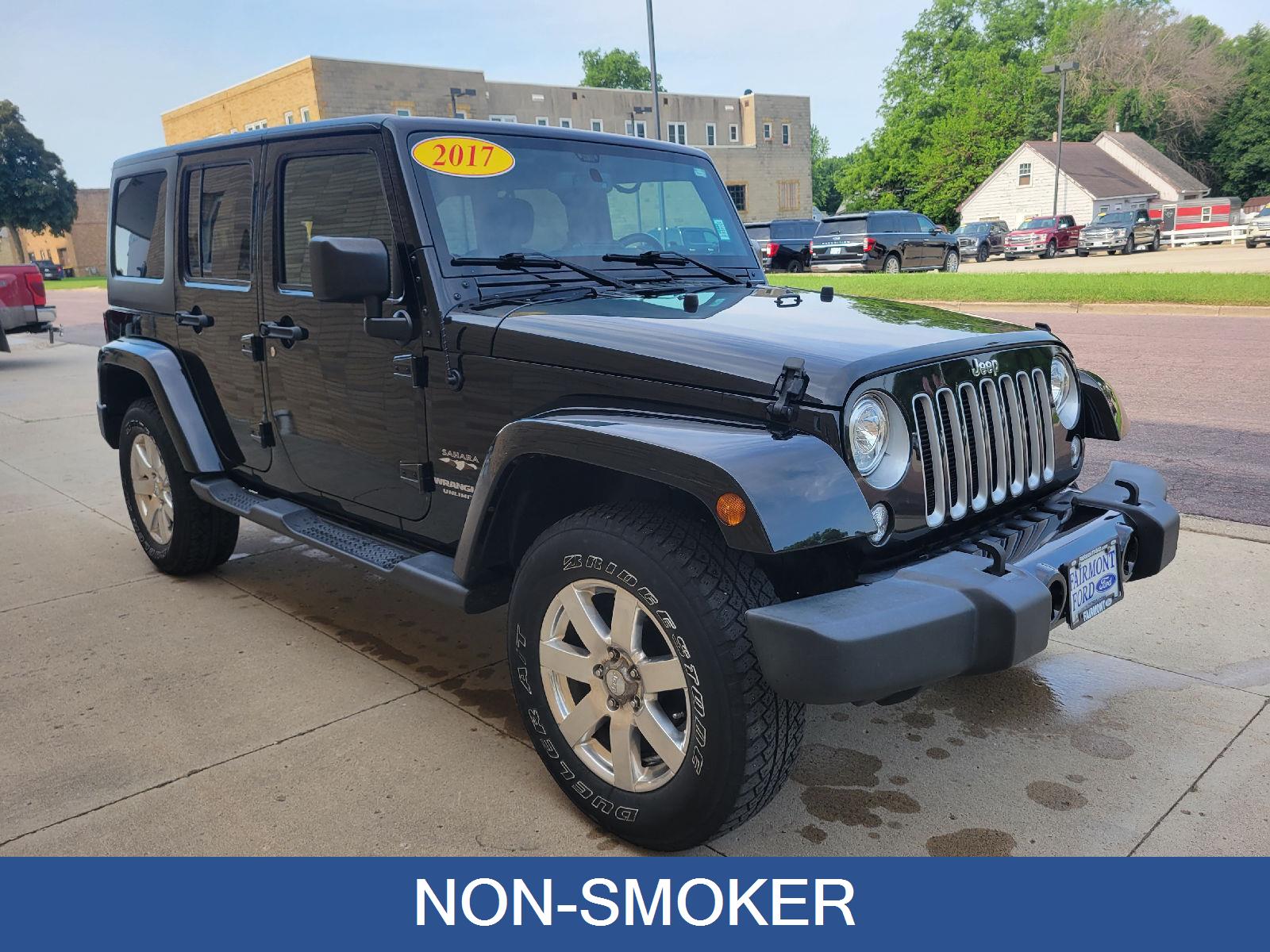 Used 2017 Jeep Wrangler Unlimited Sahara with VIN 1C4BJWEG2HL577704 for sale in Fairmont, Minnesota