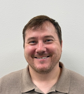 Staff member Carl Saxon from ID_f4c066