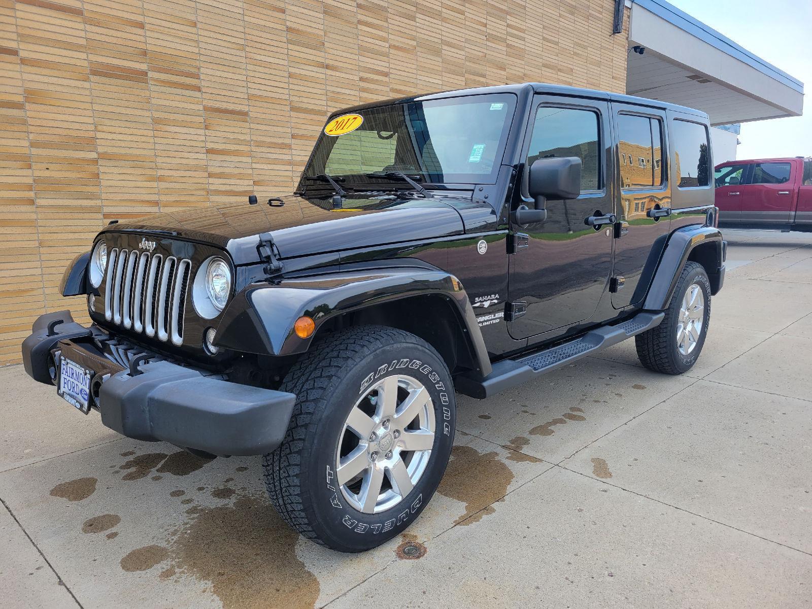 Used 2017 Jeep Wrangler Unlimited Sahara with VIN 1C4BJWEG2HL577704 for sale in Fairmont, Minnesota