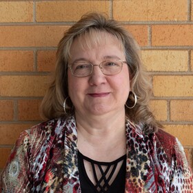 Staff member Karen Smith from 7797a1fb11e2