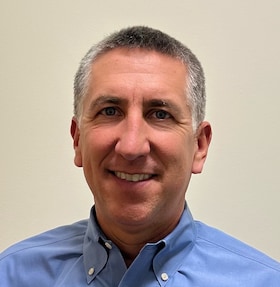 Staff member Chris Sarat from 8c31597685ce