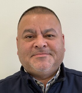 Staff member Jorge Suarez from 093521ad80fd