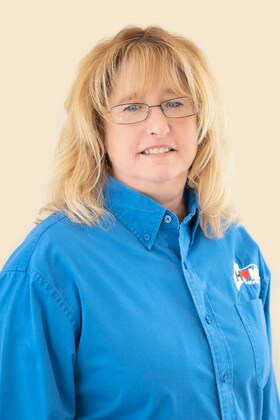 Staff member Lori Chouinard from ID_ece325809dd8