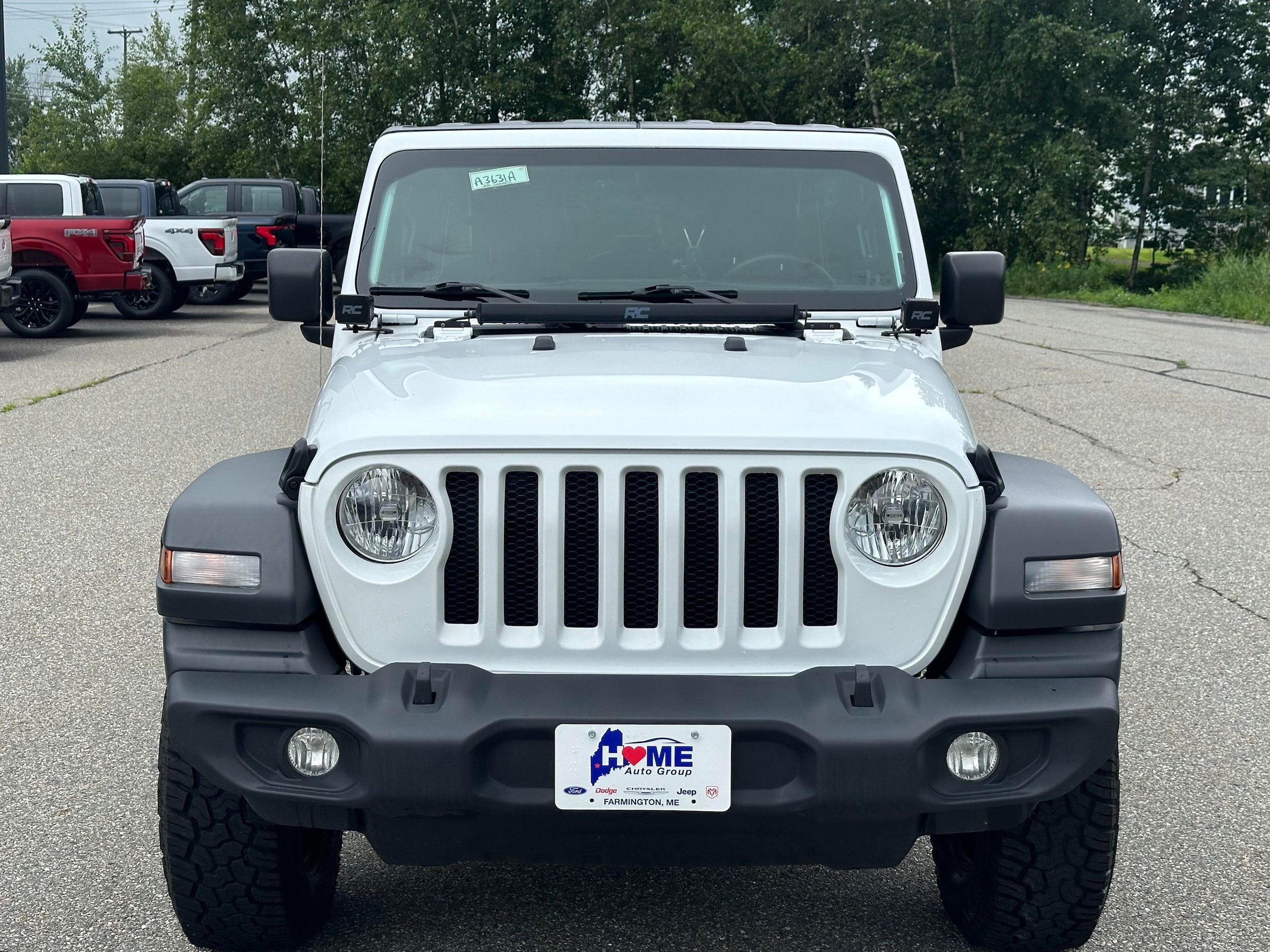 Used 2023 Jeep Wrangler 4-Door Sport with VIN 1C4HJXDG7PW507386 for sale in Farmington, ME
