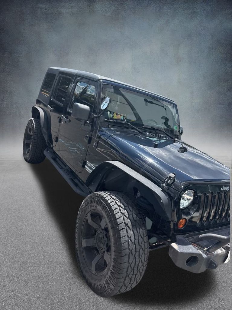 2013 Jeep Wrangler Unlimited Sport photo 2