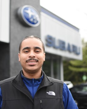 Staff member Carlos Dennis from 5a75c9e58d54