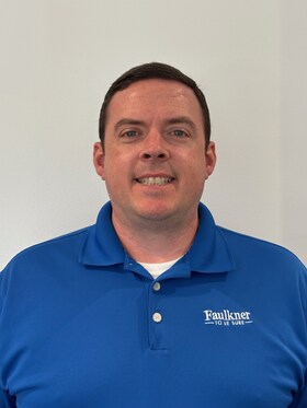 Staff member Andrew Sassane from ID_9d083f78f2f7