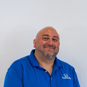 Staff member Amos Garcia from ID_54bd13