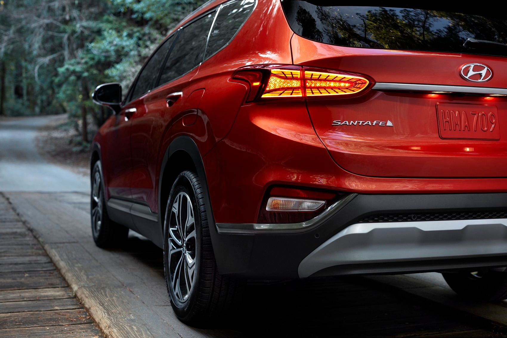 Red Hyundai Sante Fe from back