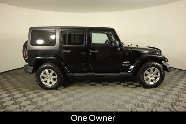 Used 2016 Jeep Wrangler Unlimited Sahara with VIN 1C4BJWEG4GL171356 for sale in Grayling, MI