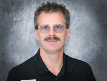 Staff member Arthur Schneider from ID_70b3b5d724fc