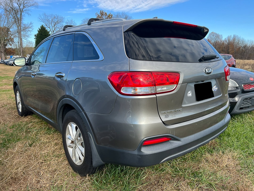 Used 2016 Kia Sorento LX with VIN 5XYPG4A36GG057592 for sale in Felton, DE