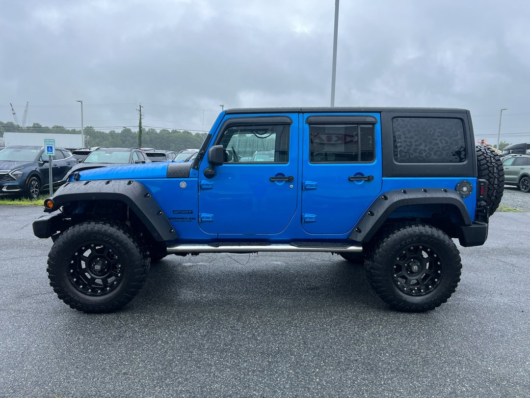 Used 2015 Jeep Wrangler Unlimited Sport with VIN 1C4BJWDG1FL503558 for sale in Felton, DE