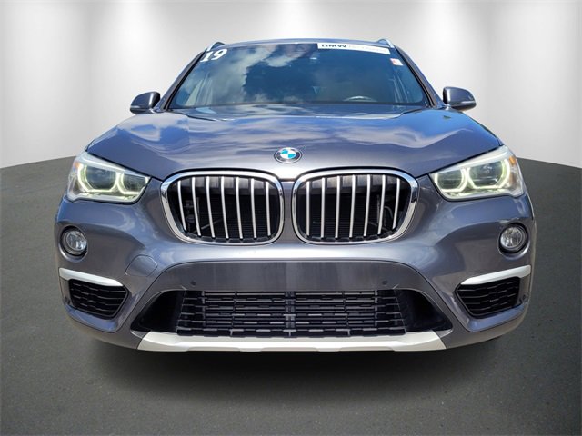 Used 2019 BMW X1 28i with VIN WBXHT3C57K5L38796 for sale in Tampa, FL