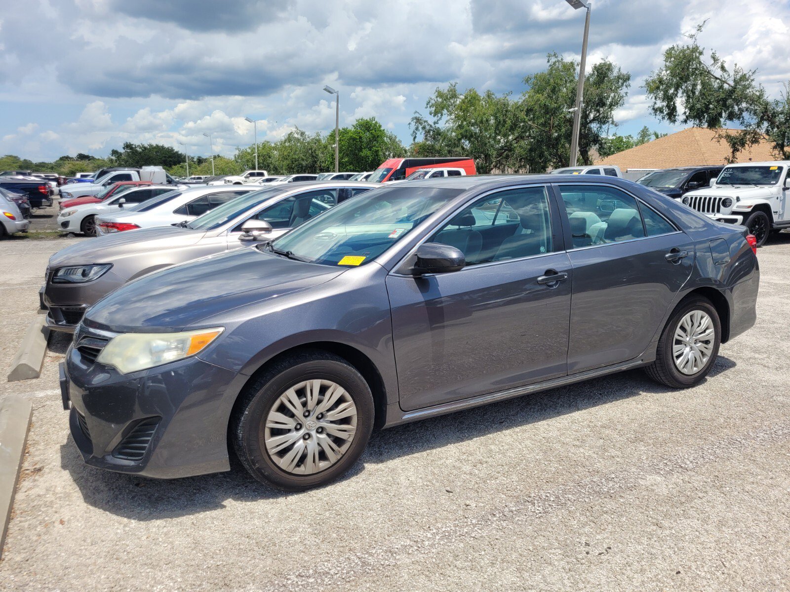 Used 2014 Toyota Camry LE with VIN 4T4BF1FK8ER398548 for sale in Tarpon Springs, FL