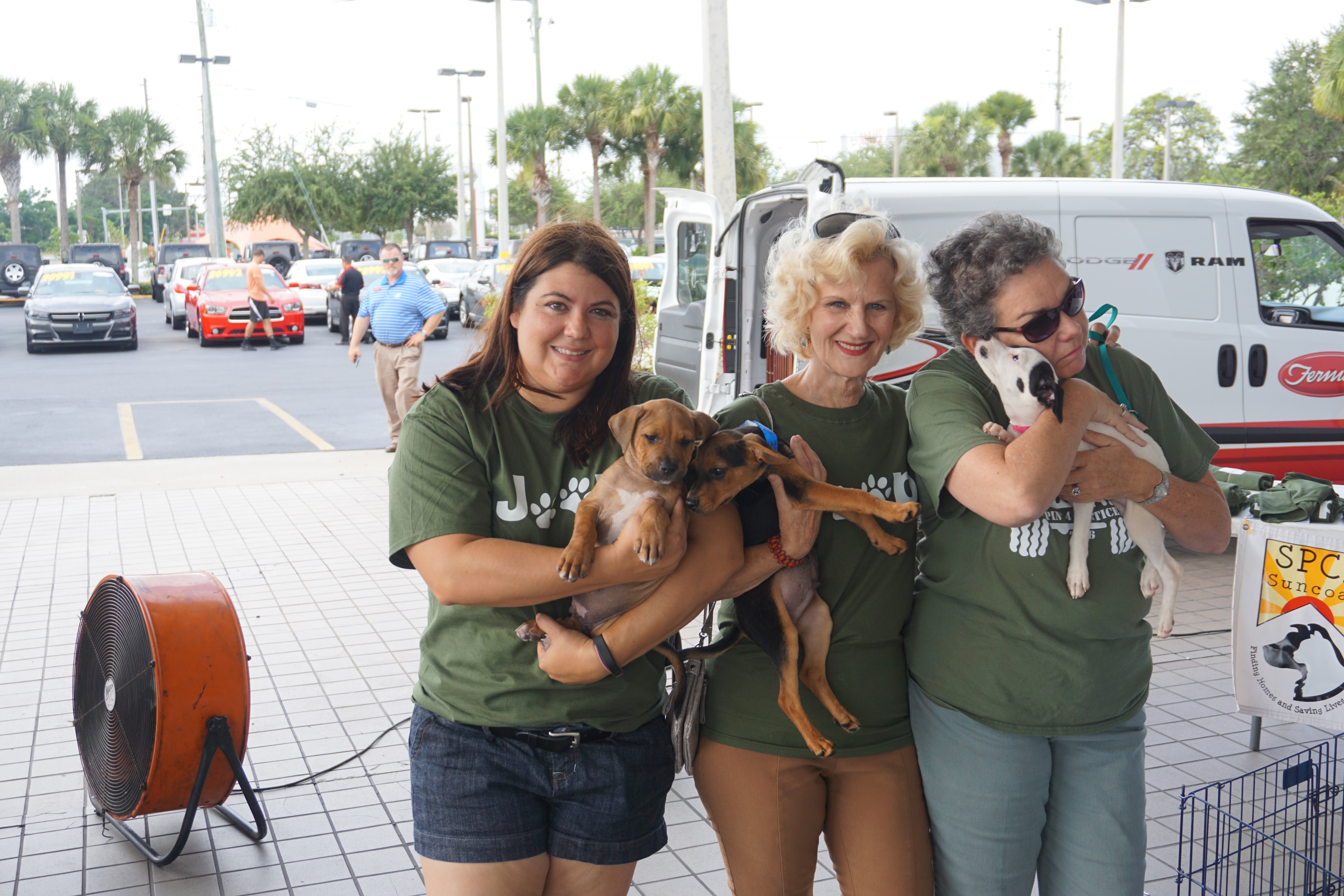 Photo of Ferman New Port Richey employees at Pawsitively Unbeatable Adoption Event