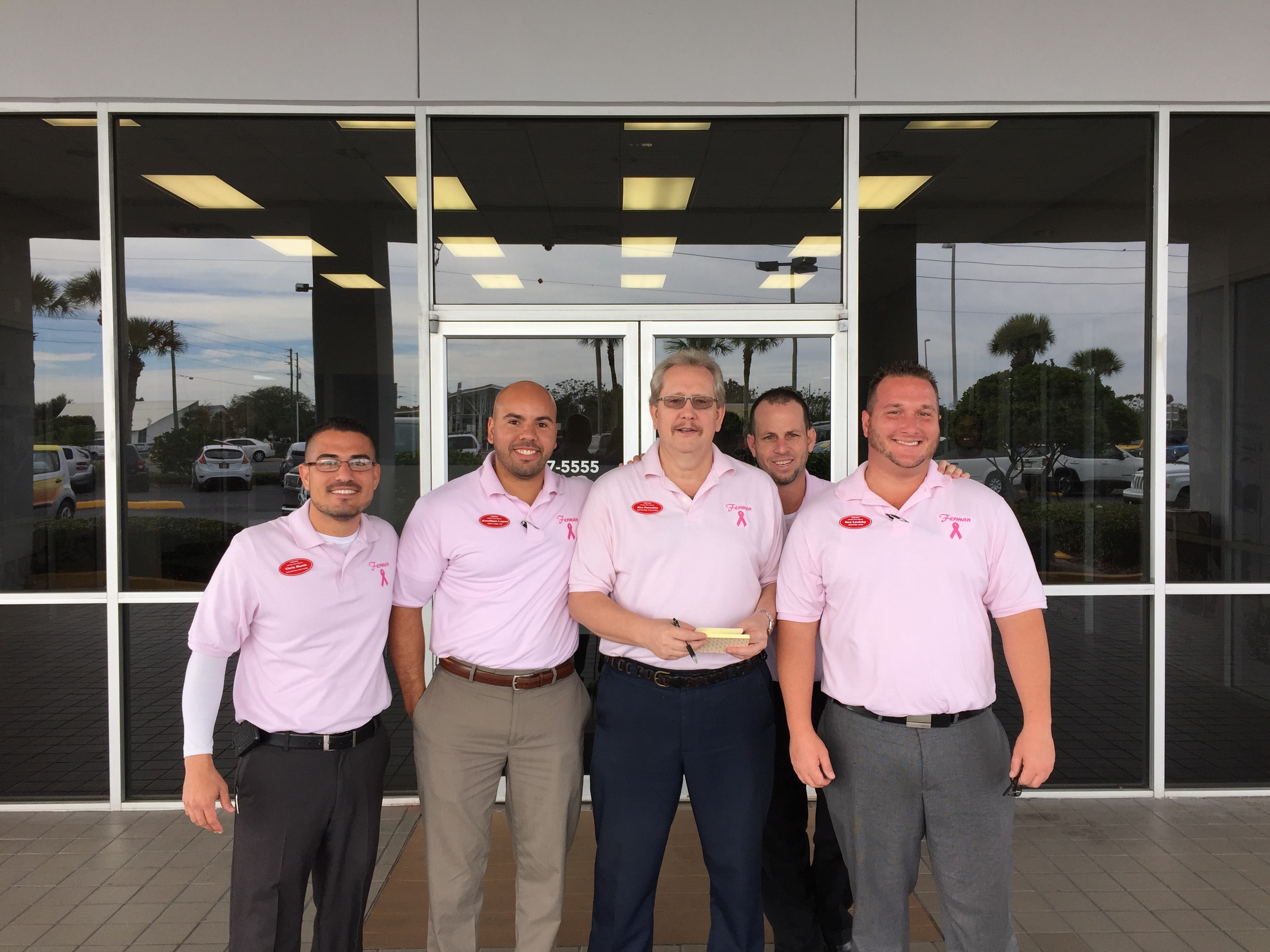 Photo of Ferman Chrysler Jeep Dodge RAM of New Port Richey employees wearing pink in support of Breast Cancer Awareness Month