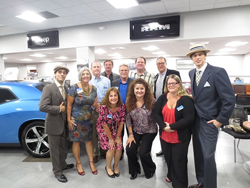 photo of Ferman New Port Richey holding its Grand Opening Event with representatives from Chrysler and friends from West Pasco Chamber of Commerce