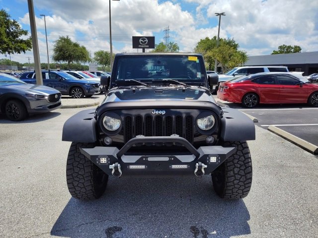 Used 2015 Jeep Wrangler Unlimited Sport with VIN 1C4BJWDG3FL575992 for sale in Palm Harbor, FL