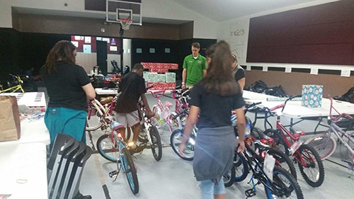 photo of Ferman Volvo donating gifts to support Cops n Kids event