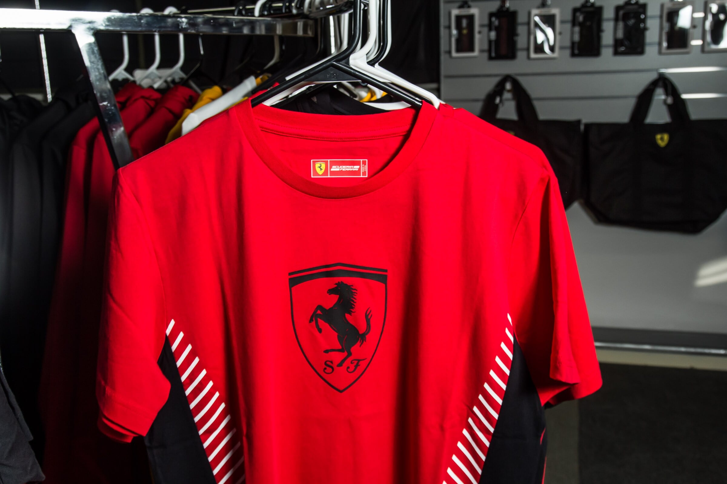  Person cheerfully signing documents.