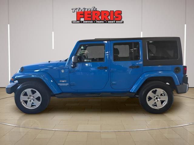 Used 2012 Jeep Wrangler Unlimited Sahara with VIN 1C4HJWEG9CL124876 for sale in New Philadelphia, OH