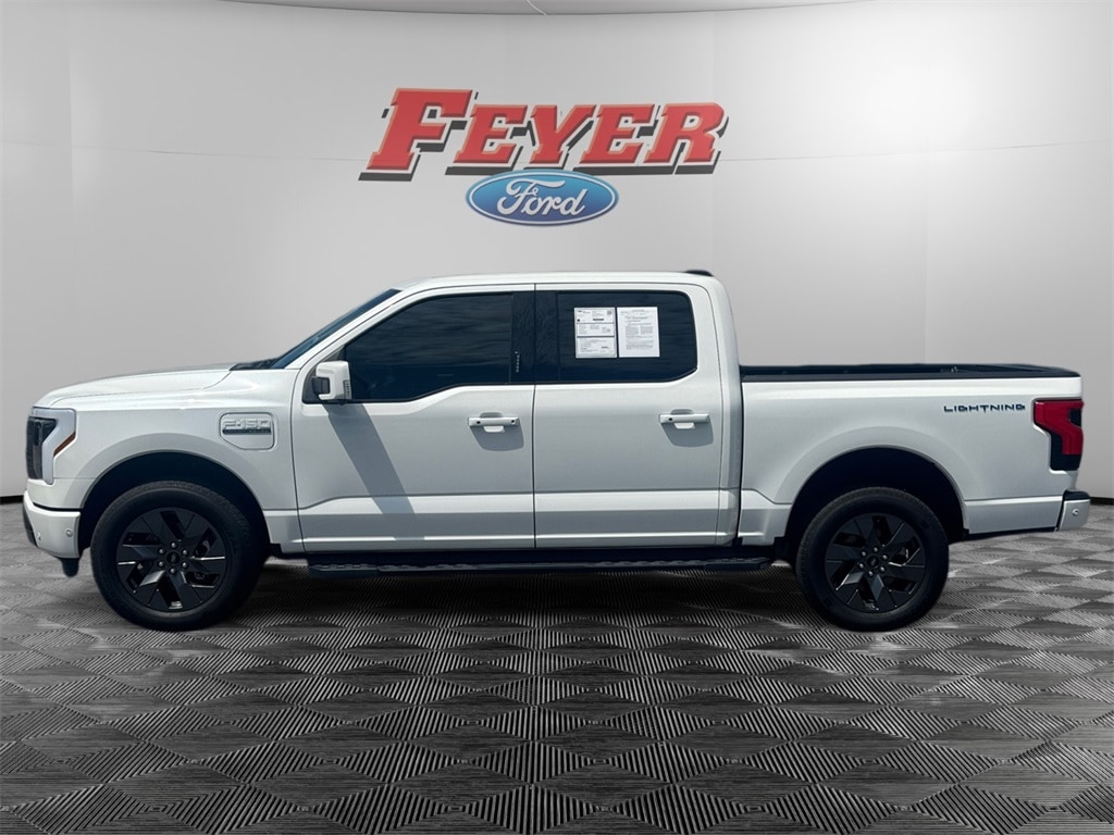 Certified 2023 Ford F-150 Lightning Lariat with VIN 1FT6W1EV9PWG08710 for sale in Plymouth, NC