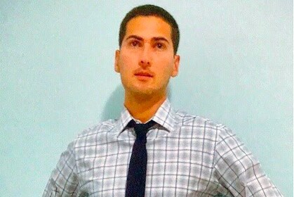Staff member Chris Nasralla from ID_32bef7cefefd