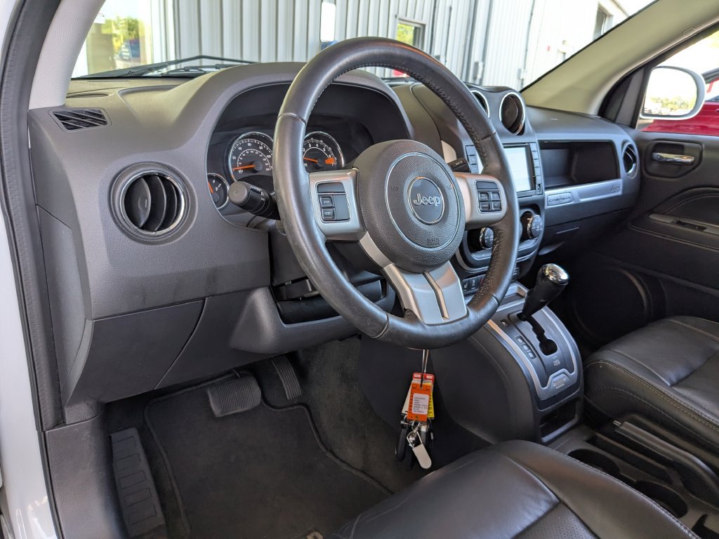 Used 2016 Jeep Compass High Altitude with VIN 1C4NJDEB9GD793418 for sale in De Motte, IN