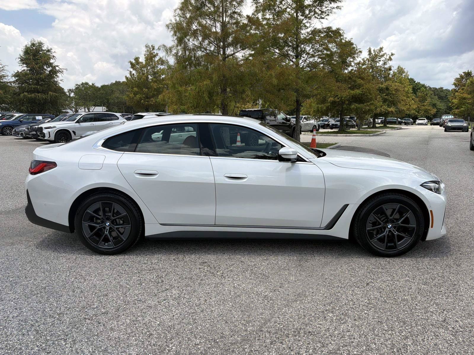 Used 2026 BMW i4 40 with VIN WBY63HD06TFW08051 for sale in Orlando, FL