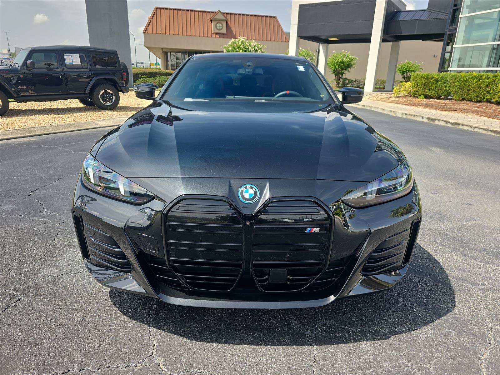 Used 2025 BMW i4 M50 with VIN WBY33HD09SFU59619 for sale in Orlando, FL